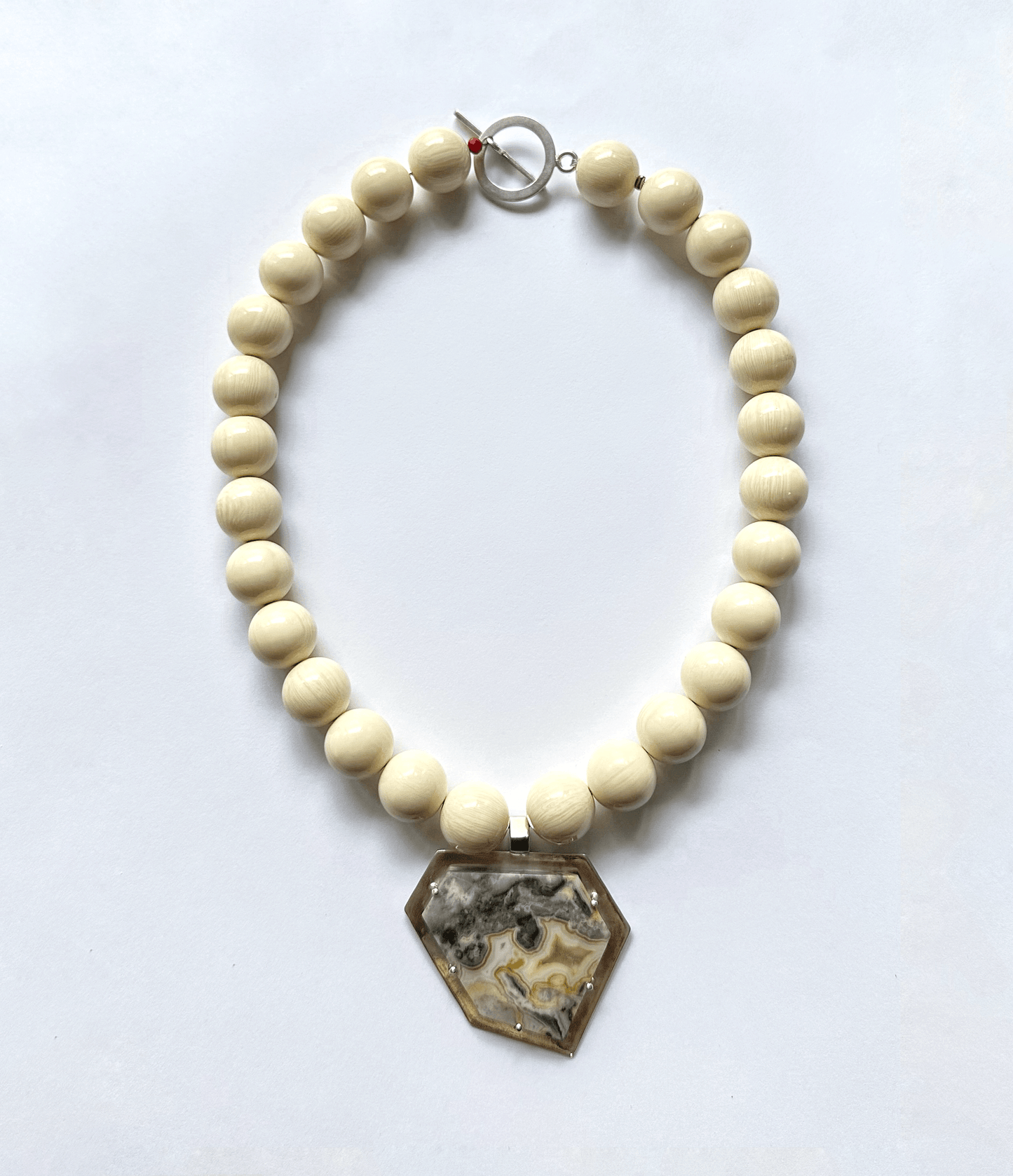 ALMA | Collar "Solar" Ámbar y Ágata Lace con Plata - GRANATE 27