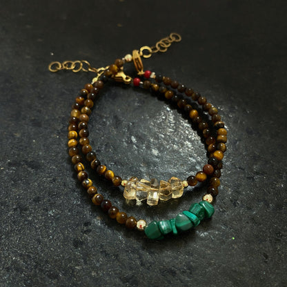 Pulsera de Ojo de Tigre y Citrino - GRANATE 27